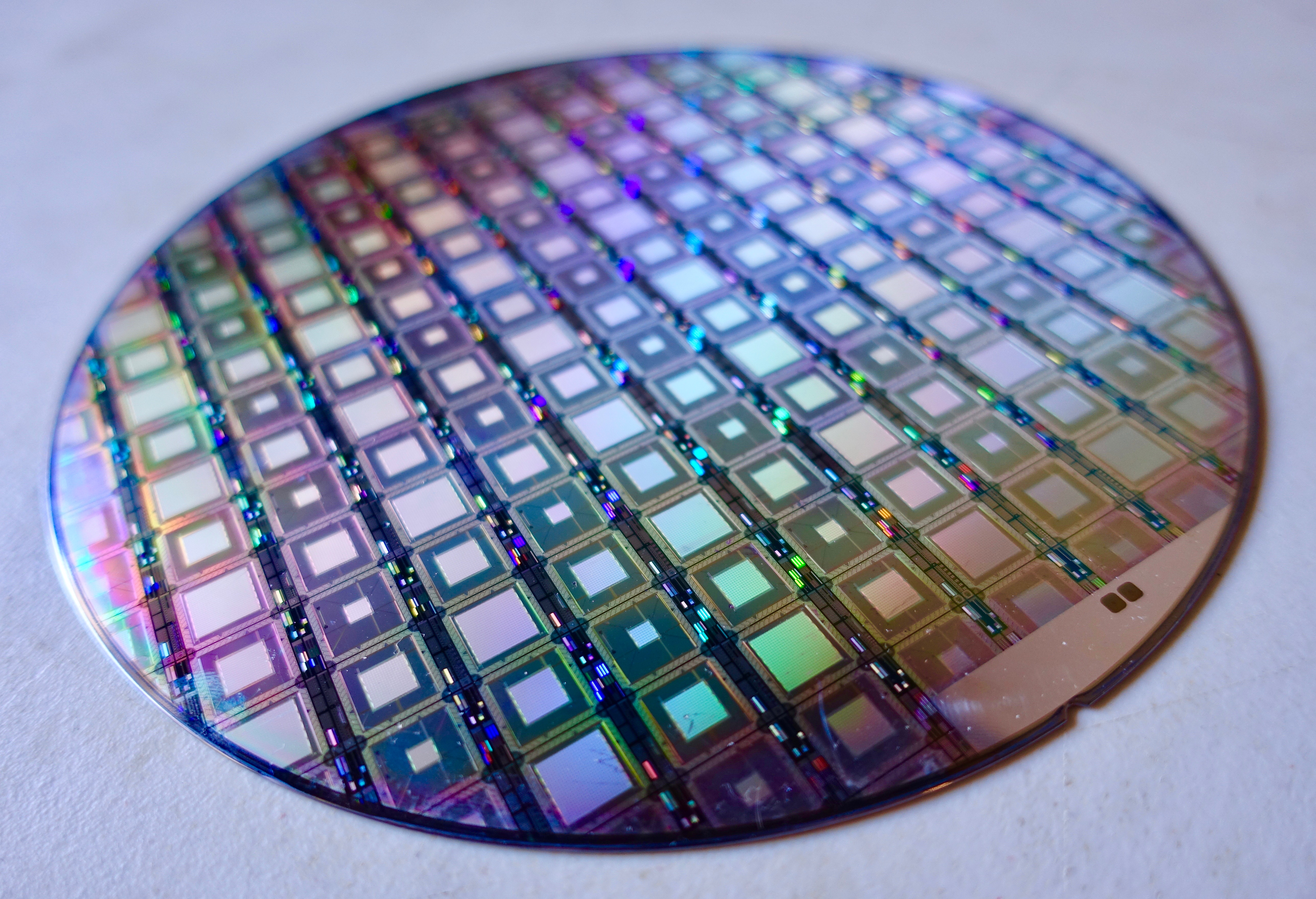 A wafer of D-Wave quantum processor chips of the Vesuvius generation, photographed in 2018.