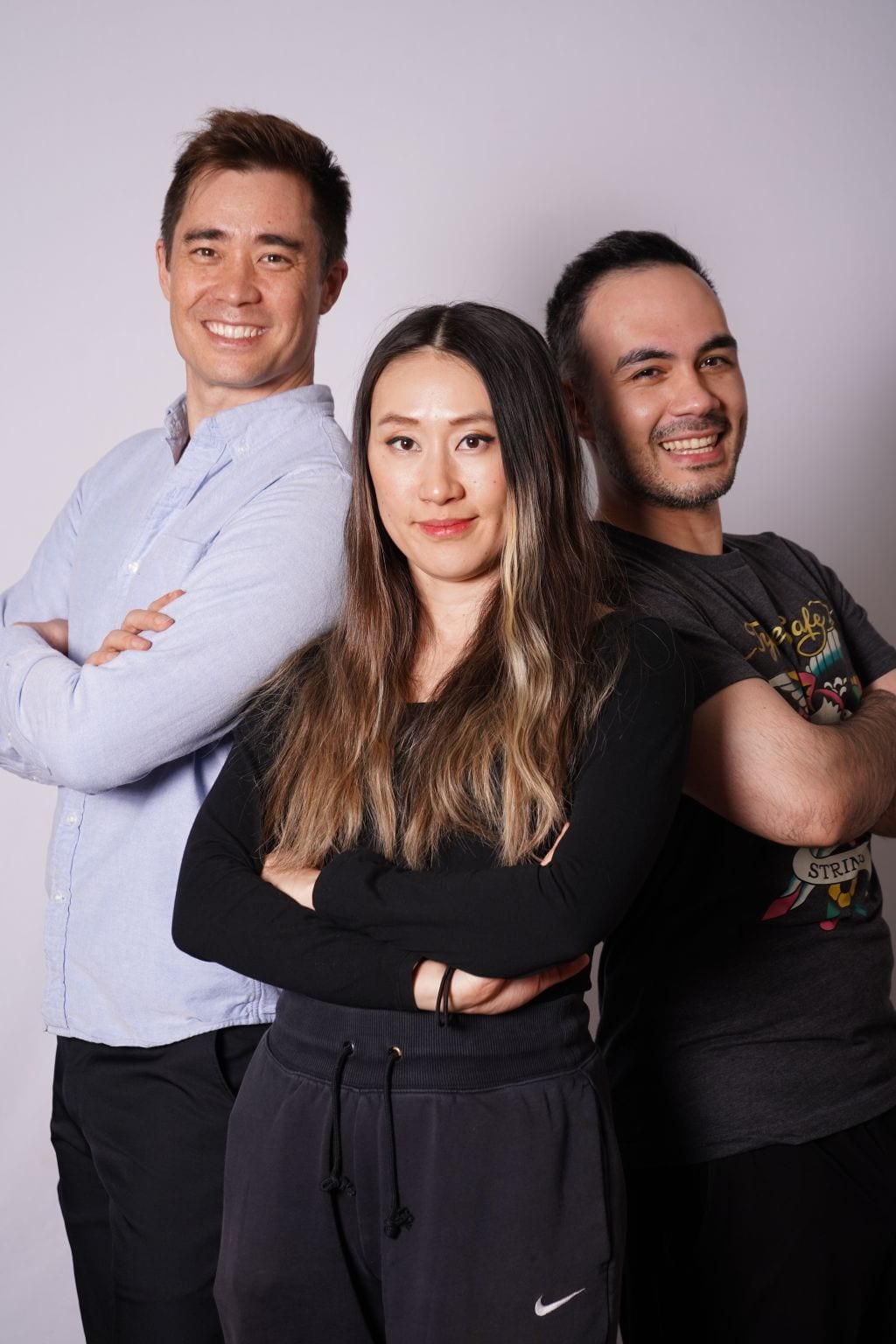 TypeSafe AI's three co-founders standing with arms crossed against a plain backdrop, chief executive Diogo Almeida at right in a TypeSafe T-shirt