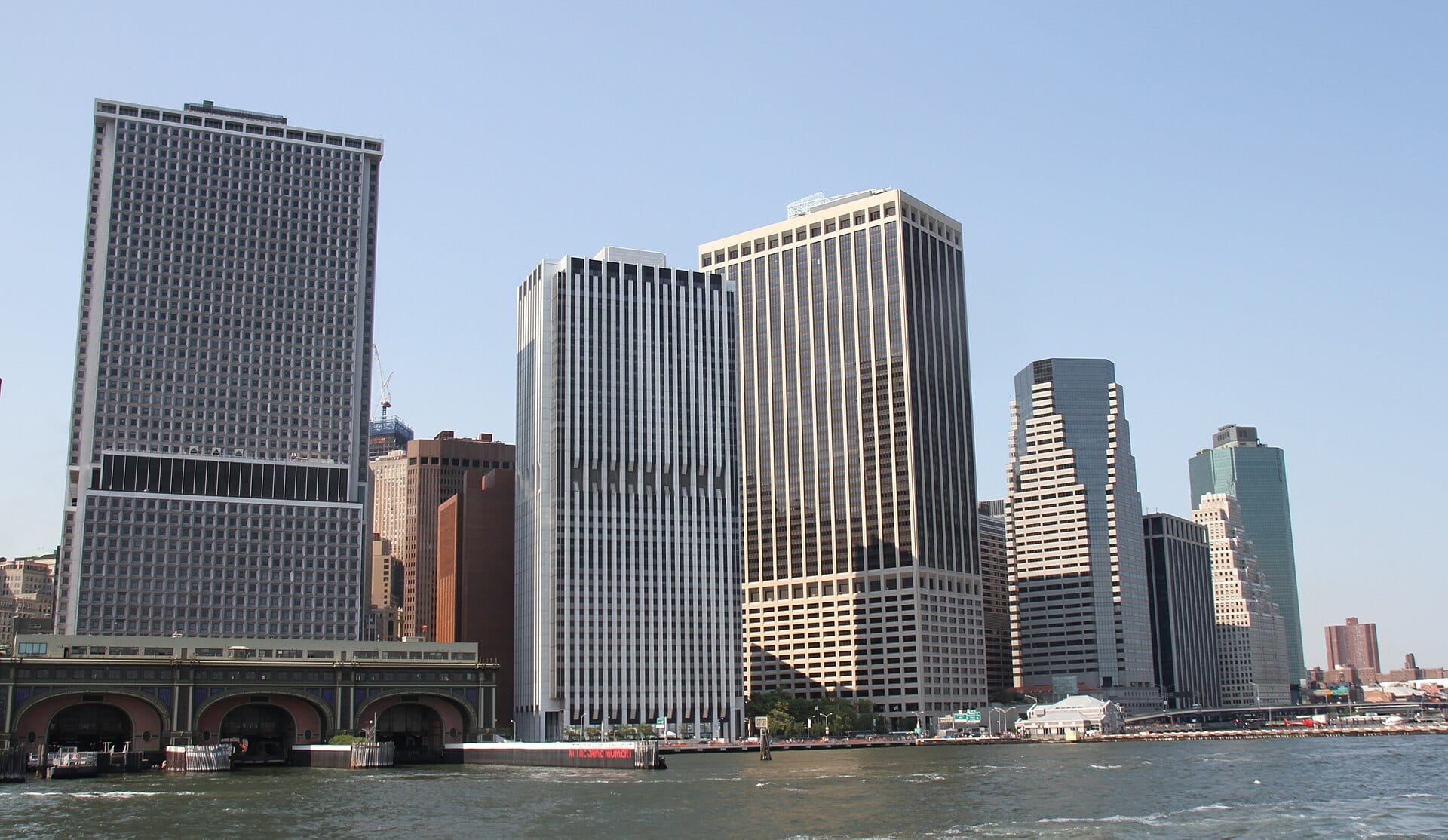 The Lower Manhattan skyline from the East River, with the tower housing Jane Street Capital's offices among the financial district skyscrapers.