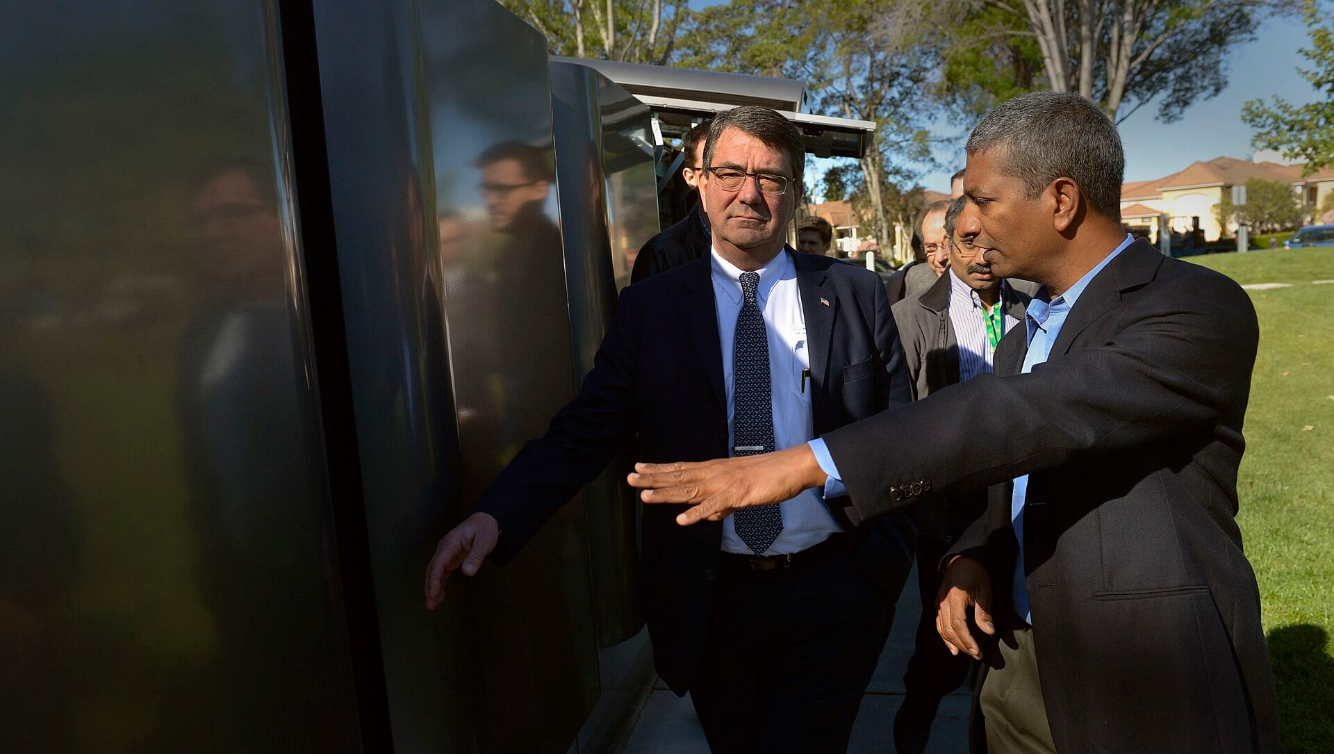 Bloom Energy CEO K.R. Sridhar, right, shows the company's fuel cell servers to then-Deputy Defense Secretary Ashton B. Carter