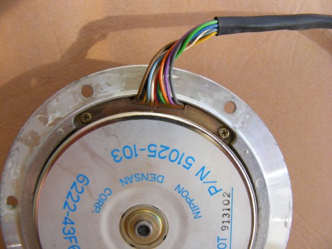 A small motor with Nippon Densan, Nidec's original name, printed on its rotor