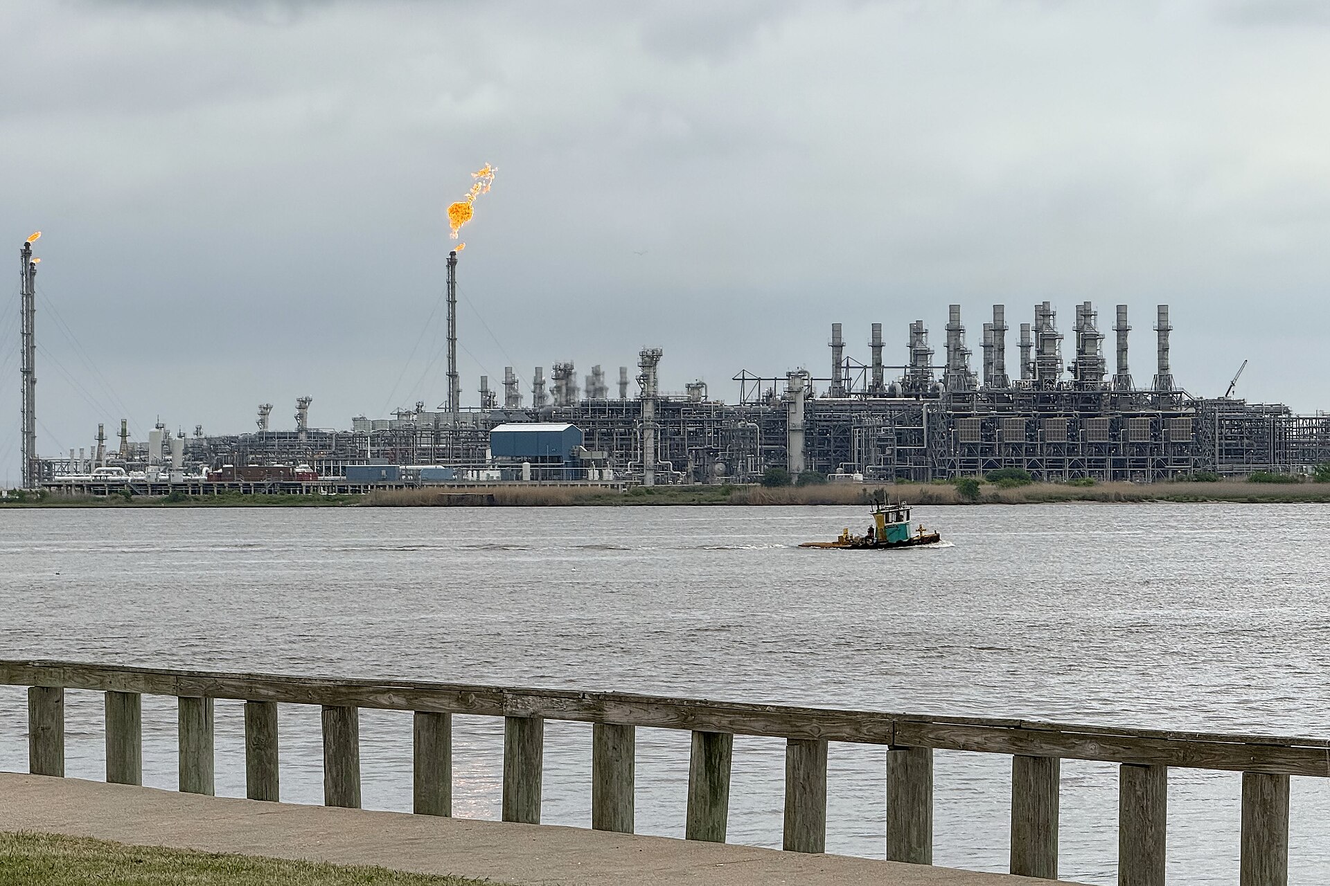 Liquefaction trains and flare stacks at the Sabine Pass LNG terminal seen across the shipping channel