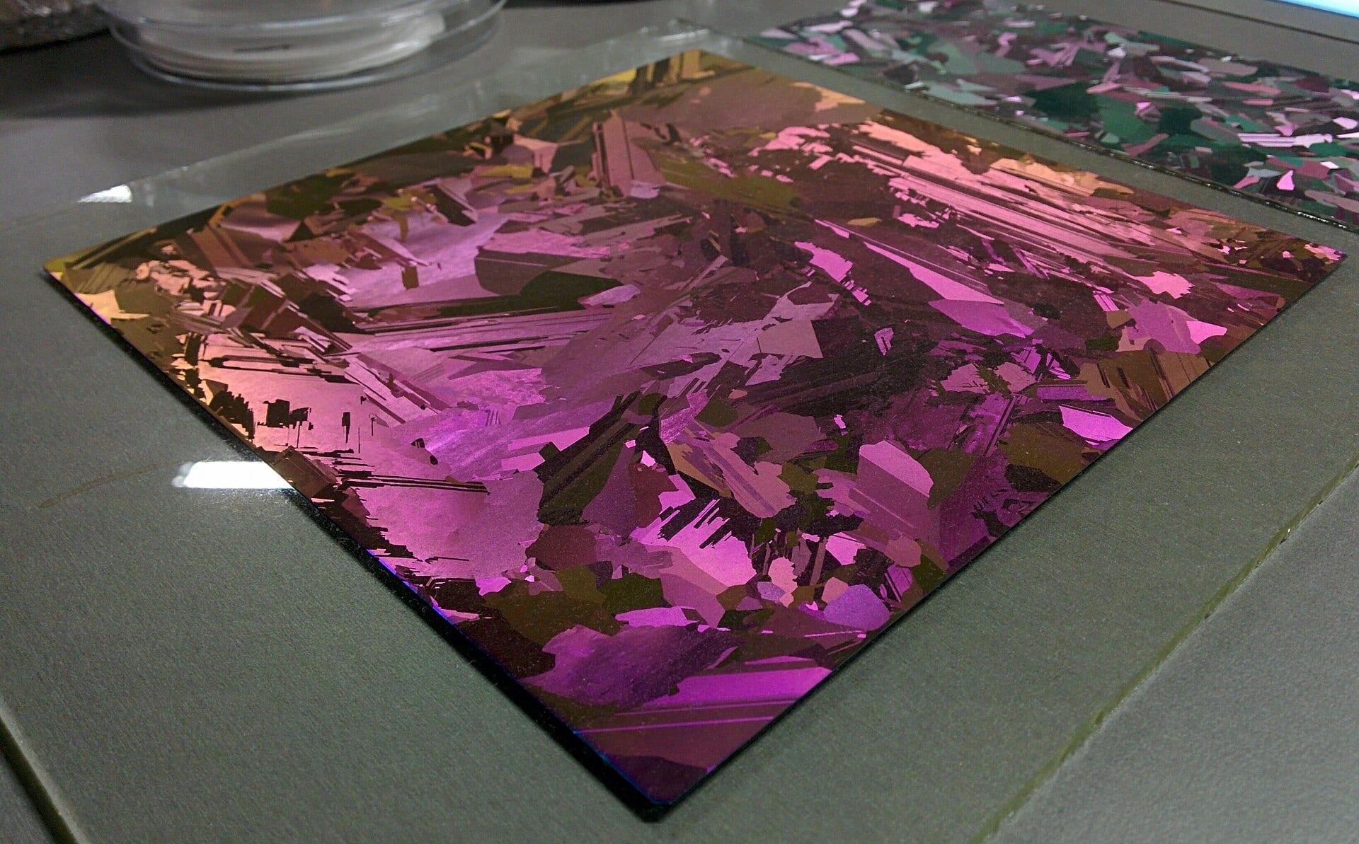 A silicon wafer with a thin-film iridescent surface, the product whose added supply Fab 9B will test