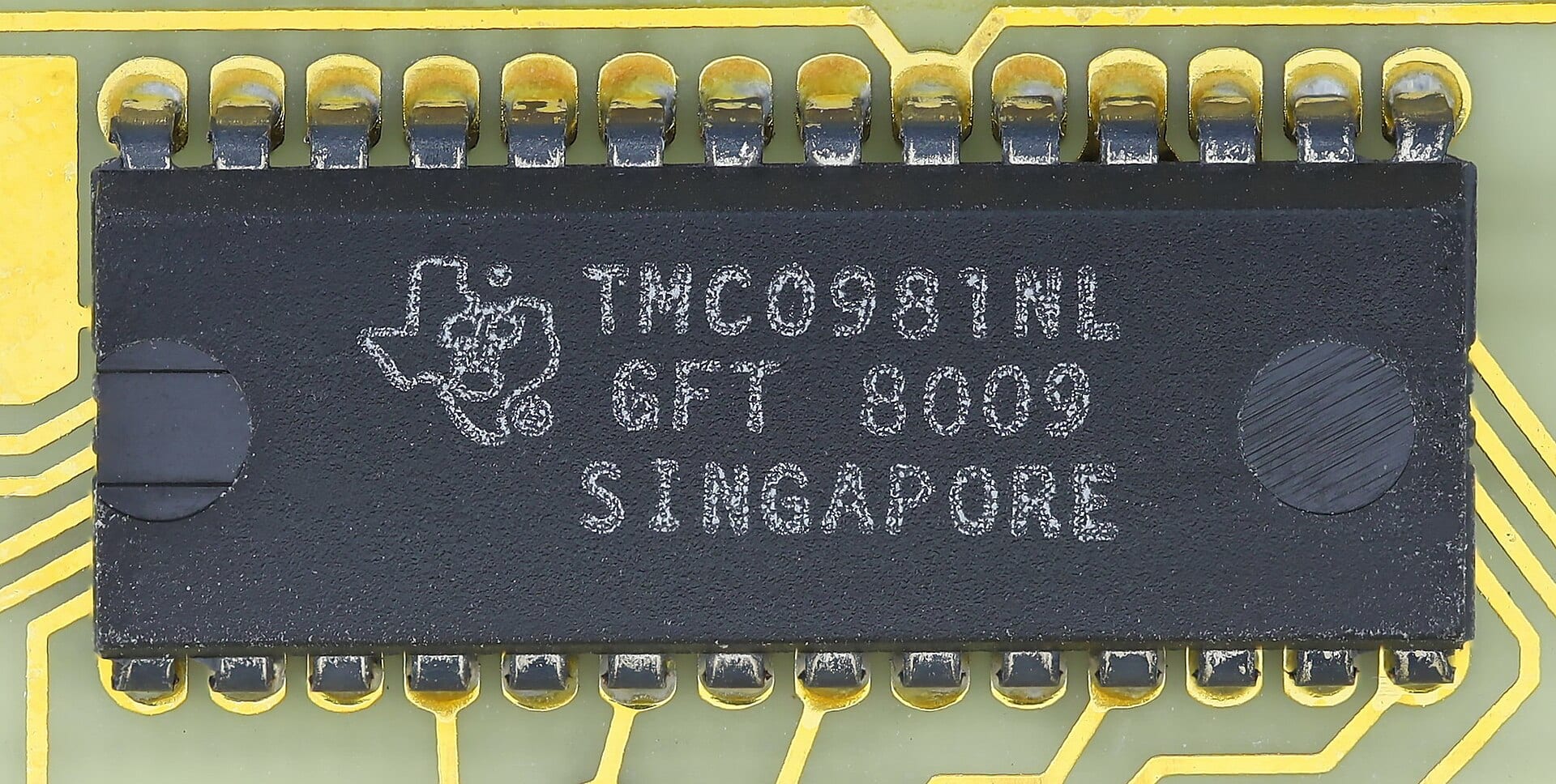 A Texas Instruments chip bearing the company's logo