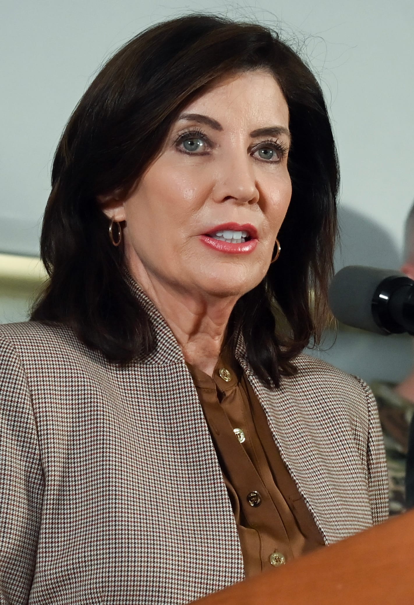 New York Governor Kathy Hochul speaking at a podium