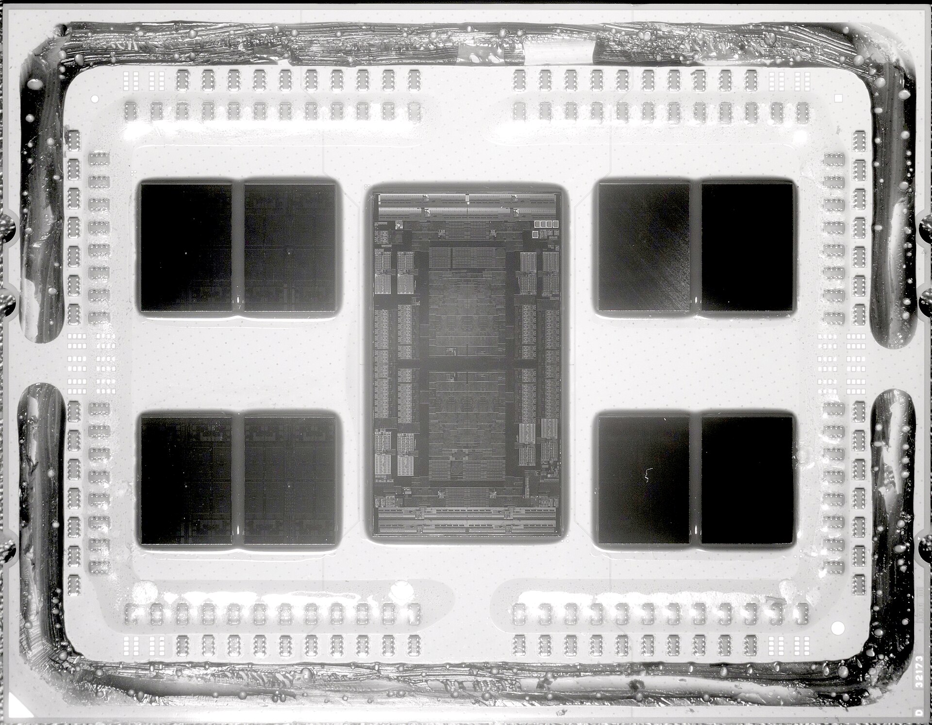 AMD EPYC 7702 package showing eight compute chiplets arranged around a central I/O die