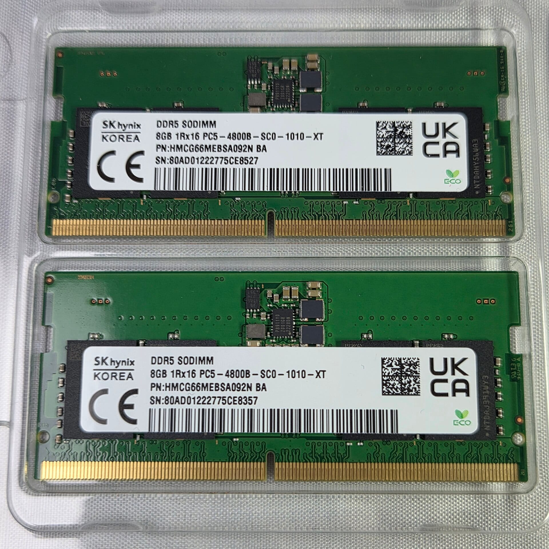 Two SK hynix 8GB DDR5-4800 SO-DIMM memory modules in a clear plastic case, labels showing the SK hynix brand and Korea as origin
