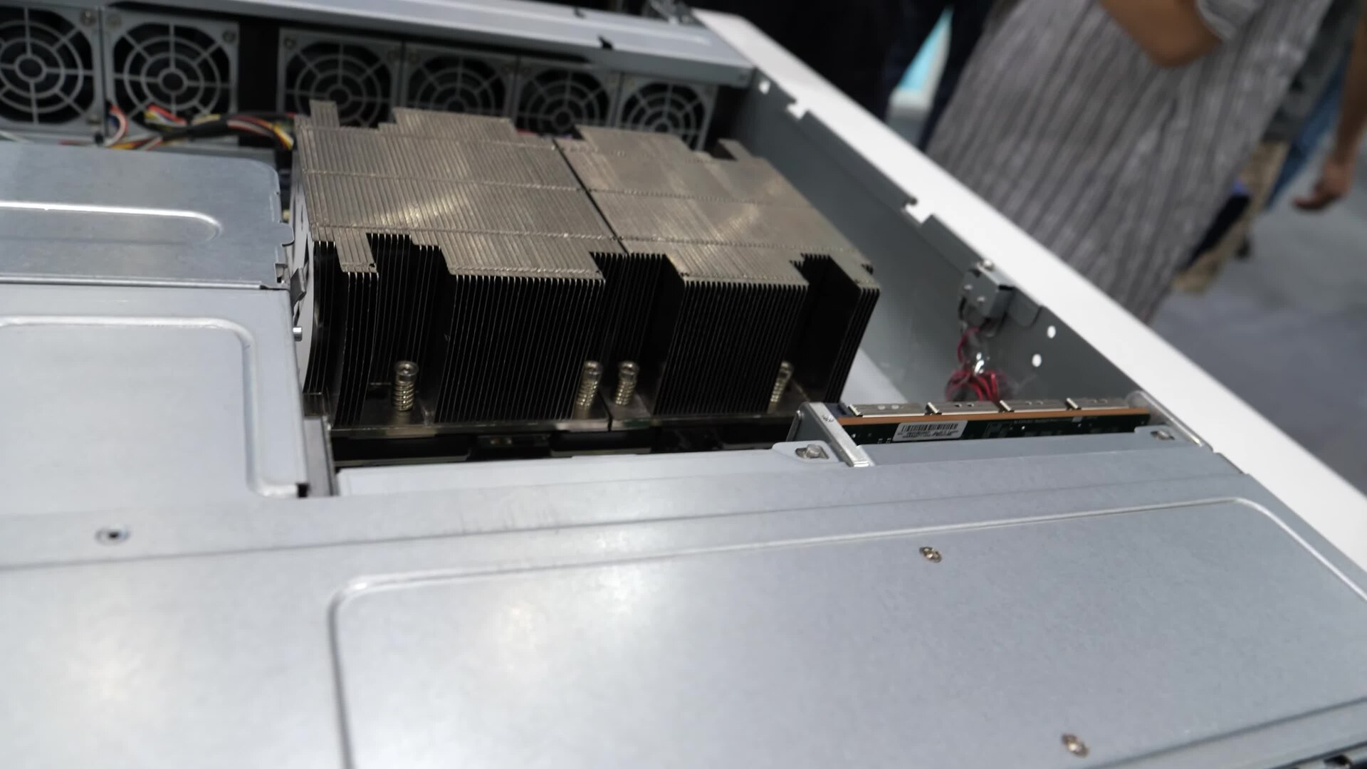 Open Supermicro server chassis showing heatsinks, fans and memory slots
