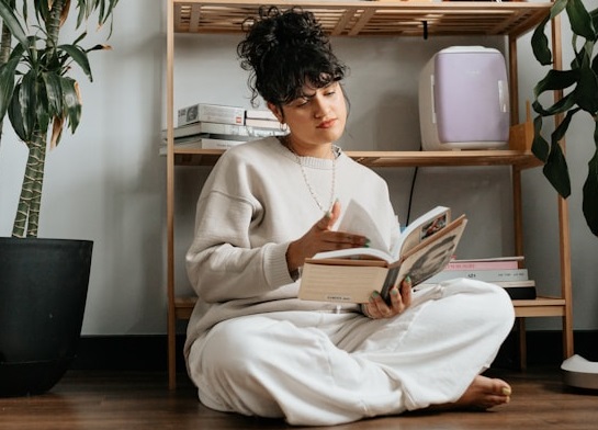 Woman Reading Crossed Legs