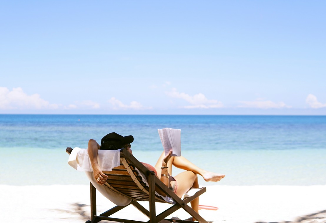 WomanReadingOnTheBeach.jpg