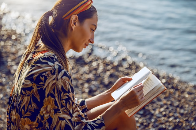 WomanReadingPebbleBeach.jpg