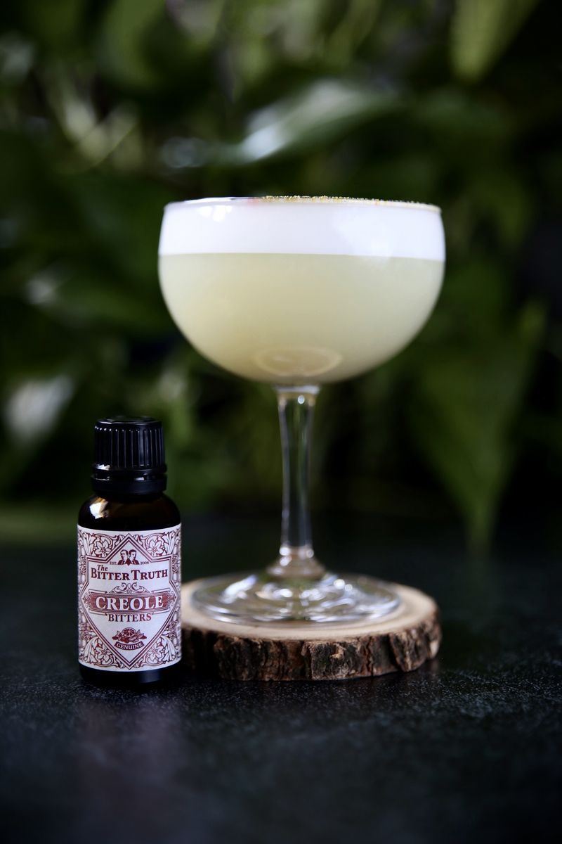 This simple sour is a good way to try out new bottles of absinthe and tequila blanco, along with working on your garnish game. 
