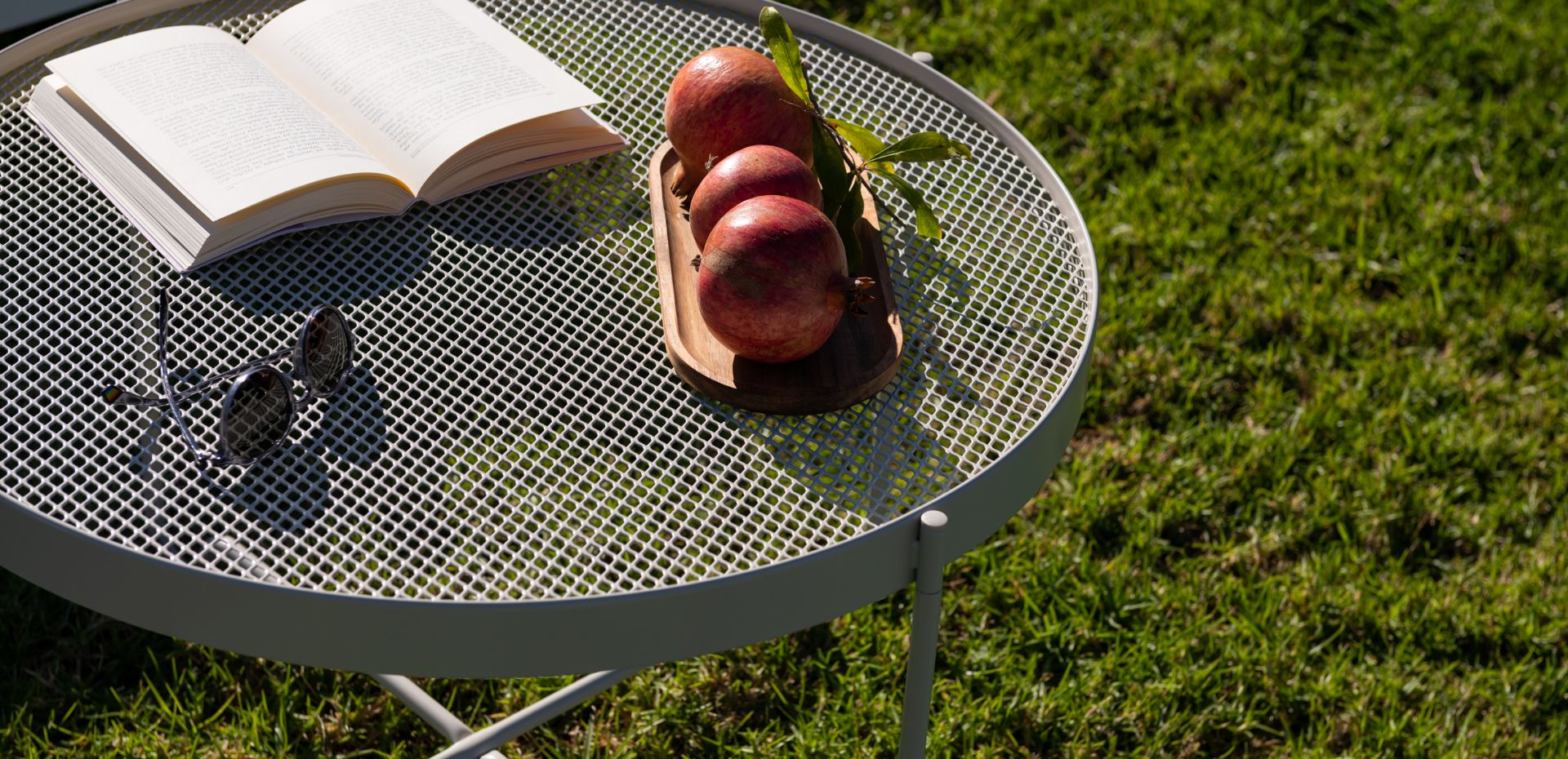 table in the yard of Theros Residence