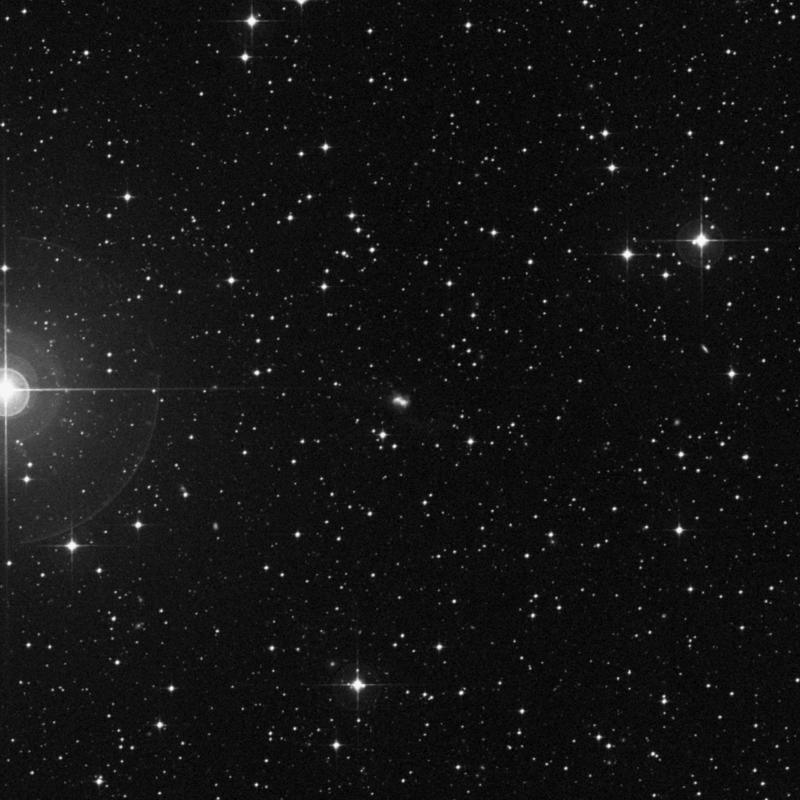 Image of IC 2153 NED02 - Irregular Galaxy in Columba star