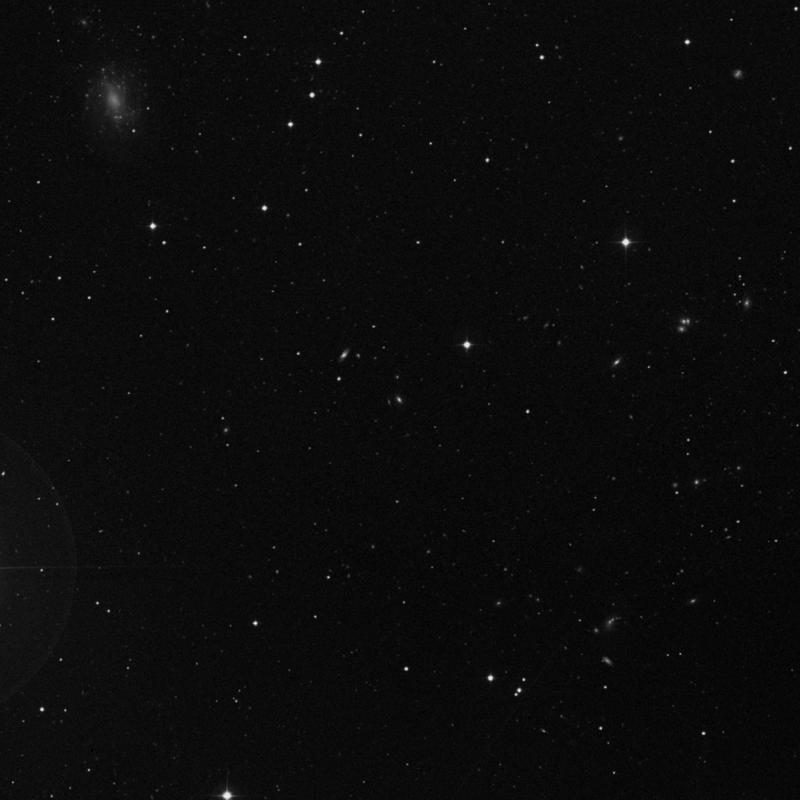 Image of IC 3299 - Barred Spiral Galaxy in Coma Berenices star
