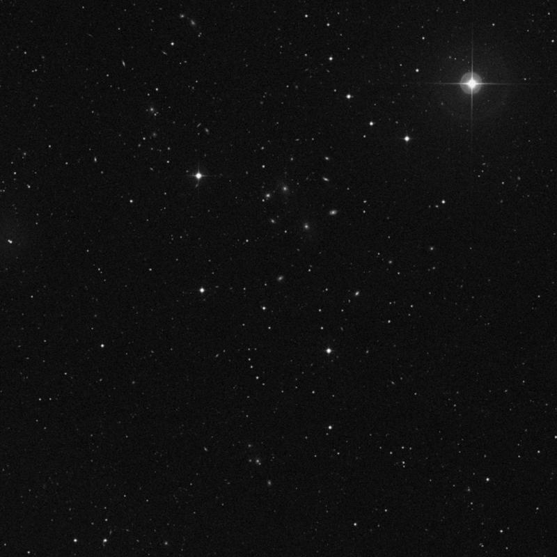 Image of IC 3873 - Barred Spiral Galaxy in Coma Berenices star