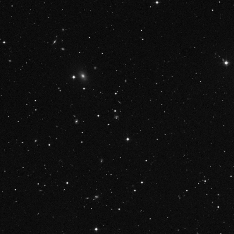 Image of IC 4056 - Barred Spiral Galaxy in Canes Venatici star