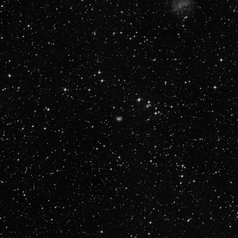 Image of IC 4713 - Barred Spiral Galaxy in Pavo star