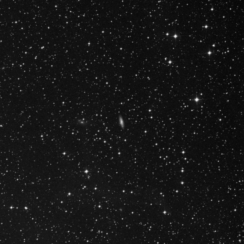 Image of IC 4851 - Barred Spiral Galaxy in Pavo star