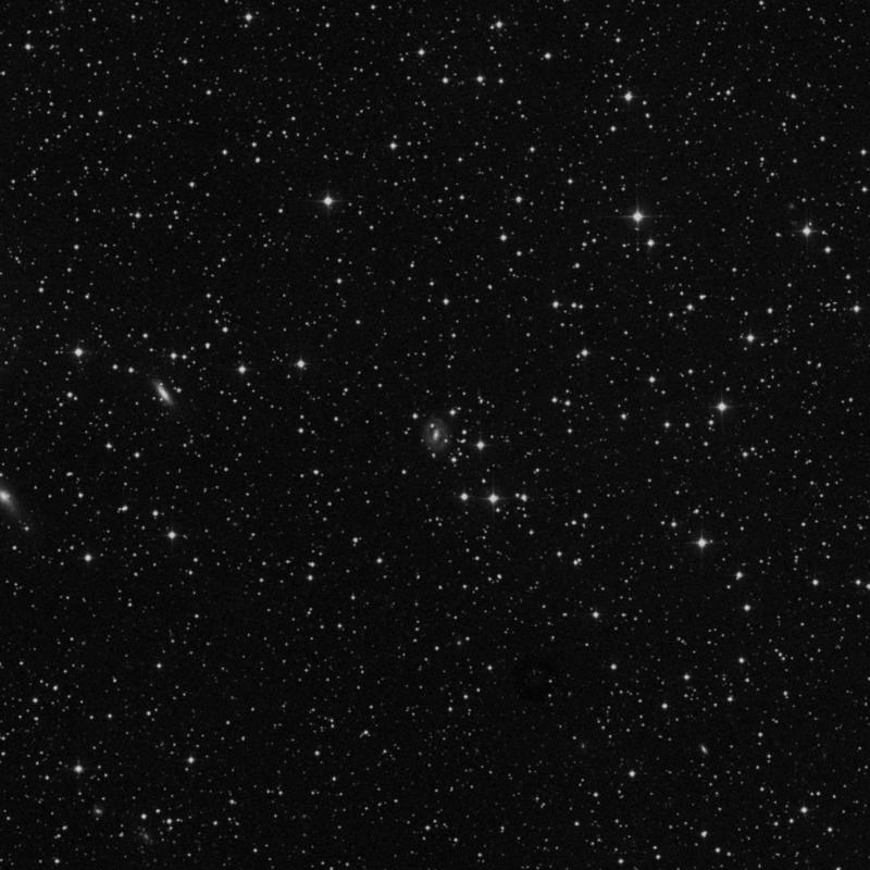 Image of NGC 920 - Barred Spiral Galaxy in Andromeda star
