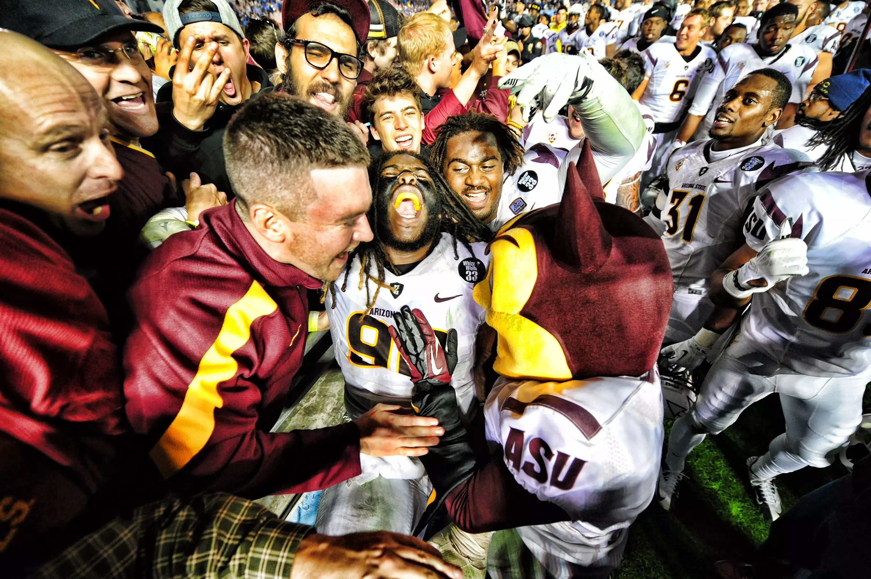 The Sun Devils brought the heat to Pasadena, sacking UCLA quarterback Brett Hundley nine times to lock up the Pac-12 South Division..webp