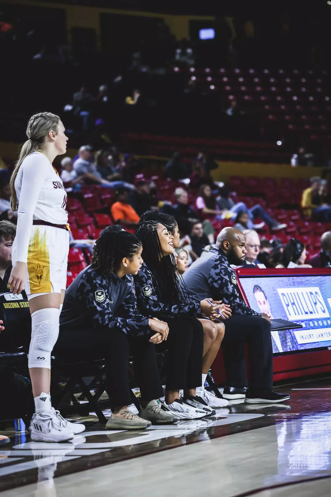 Assistant-Coach-cheering-from-bench.webp