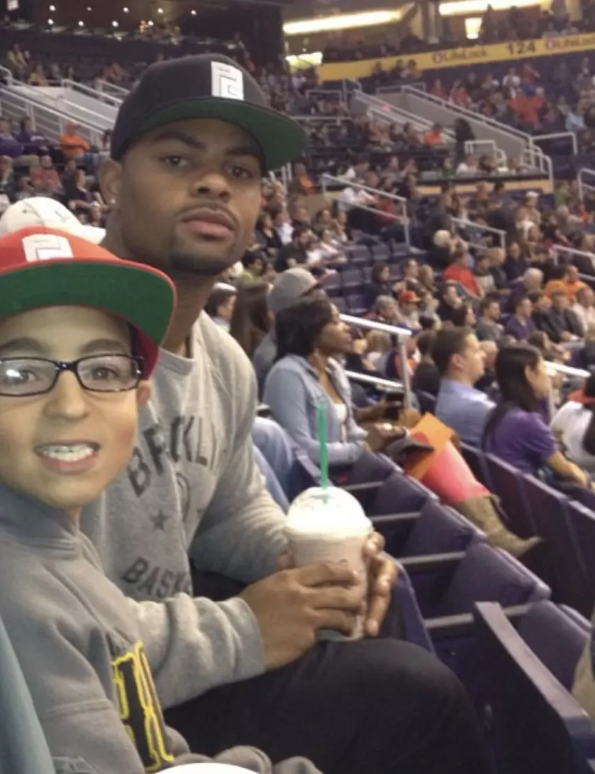 magee-family-at-game.webp