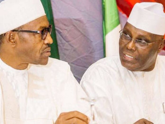 [Image: 14601c05-atiku-vs-buhari-696x522.jpg]