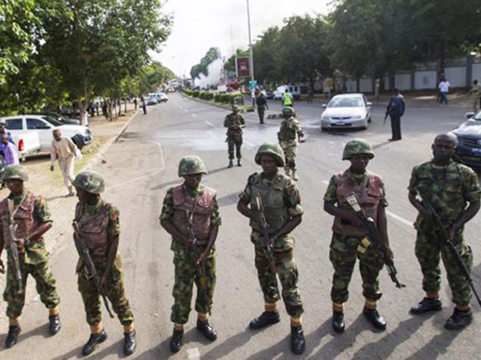 3bd53f27 men of the nigeria army Army Bars PDP Agents from Collation Centres in Rivers