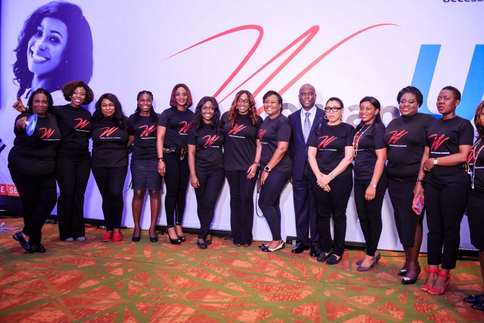 Herbert Wigwe (Centre) and members of Access Bank W community at The W Initiative International Women's Day conference 2019