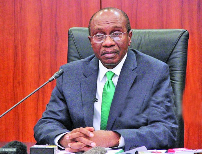 e26dab08 godwin emefiele CBN to Blacklist Bank Accounts Linked with Textile Smugglers