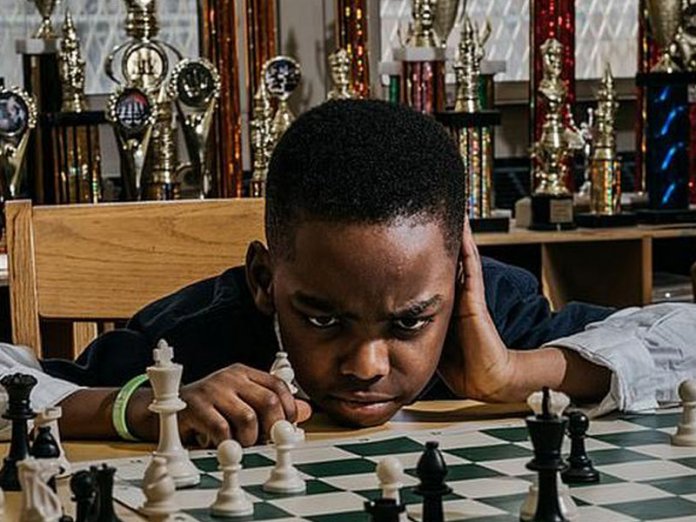 f11b4e0d tanitoluwa adewunmi Clinton Congratulates Nigerian Boy for Winning Chess Championship