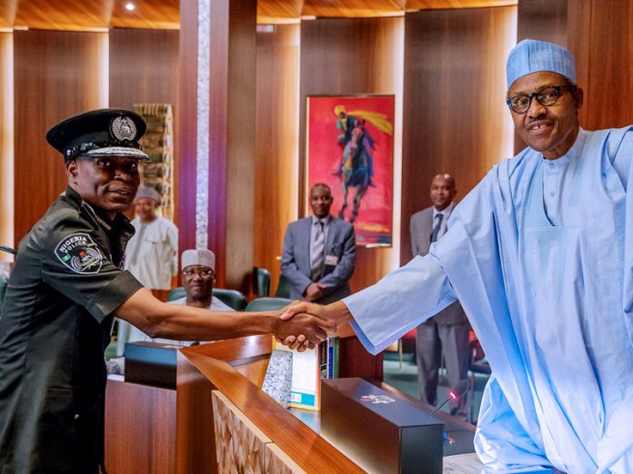 267fc51b muhammed adamu and buhari Buhari, Governors Confirm Adamu as IG