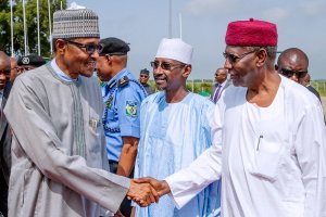 0866b4e8 buhari shakes kari News in Photographs: Buhari Leaves Abuja for New York