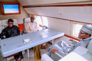 9dca8b9b buhari in the plane News in Photographs: Buhari Leaves Abuja for New York