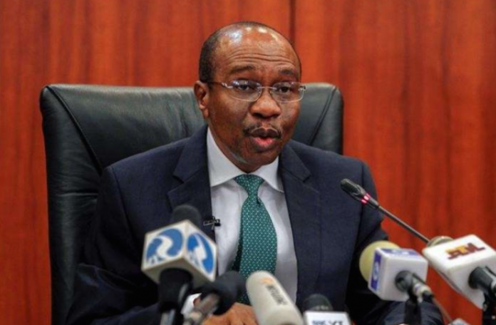 72b1134a godwin emefiele First Bank: CBN Reinstates Adeduntan, Sacks Otudeko, Bank’s Boards