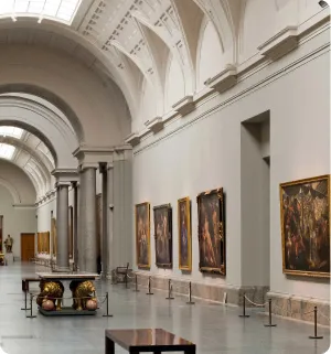 Prado Museum interior gallery Madrid vaulted ceiling paintings corridor