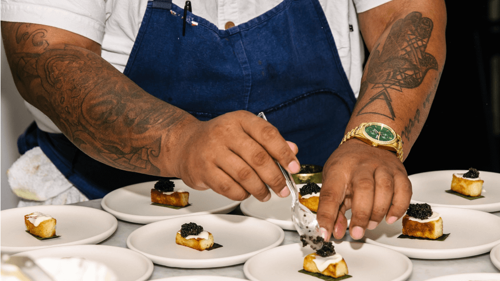 Resident - chef-plating a delicate course