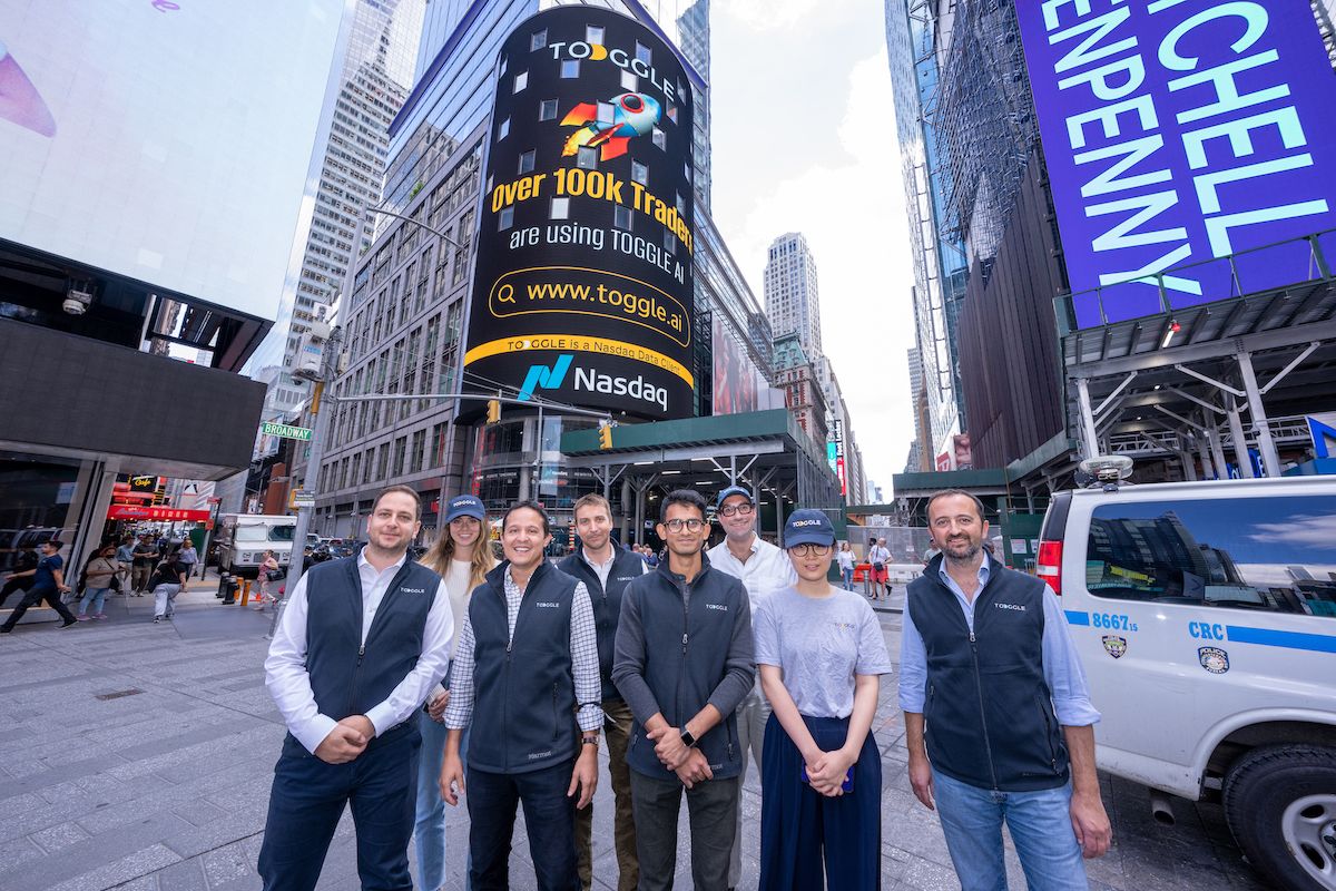 Toggle team in front of Nasdaq tower