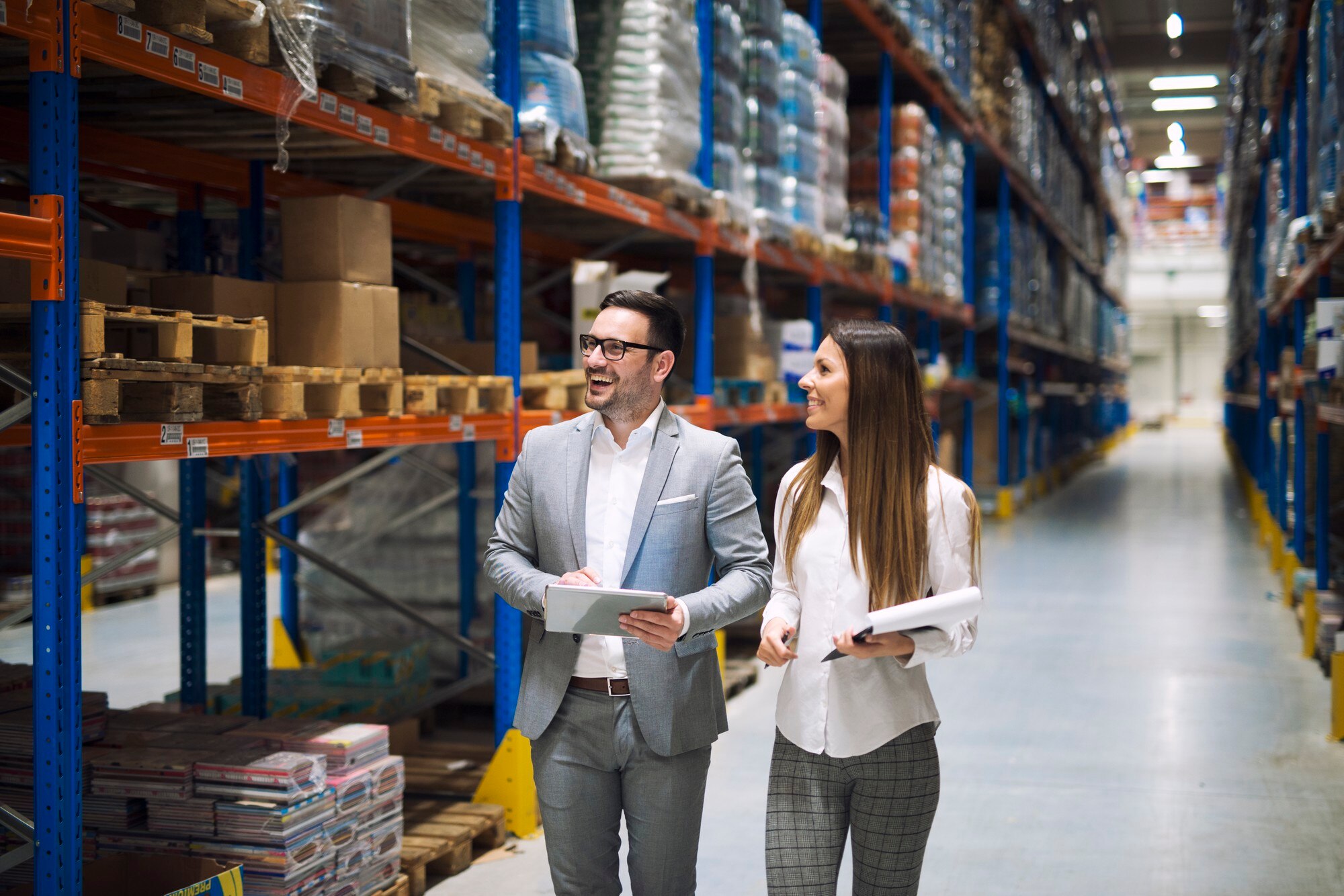 male and female workers in warehouse
