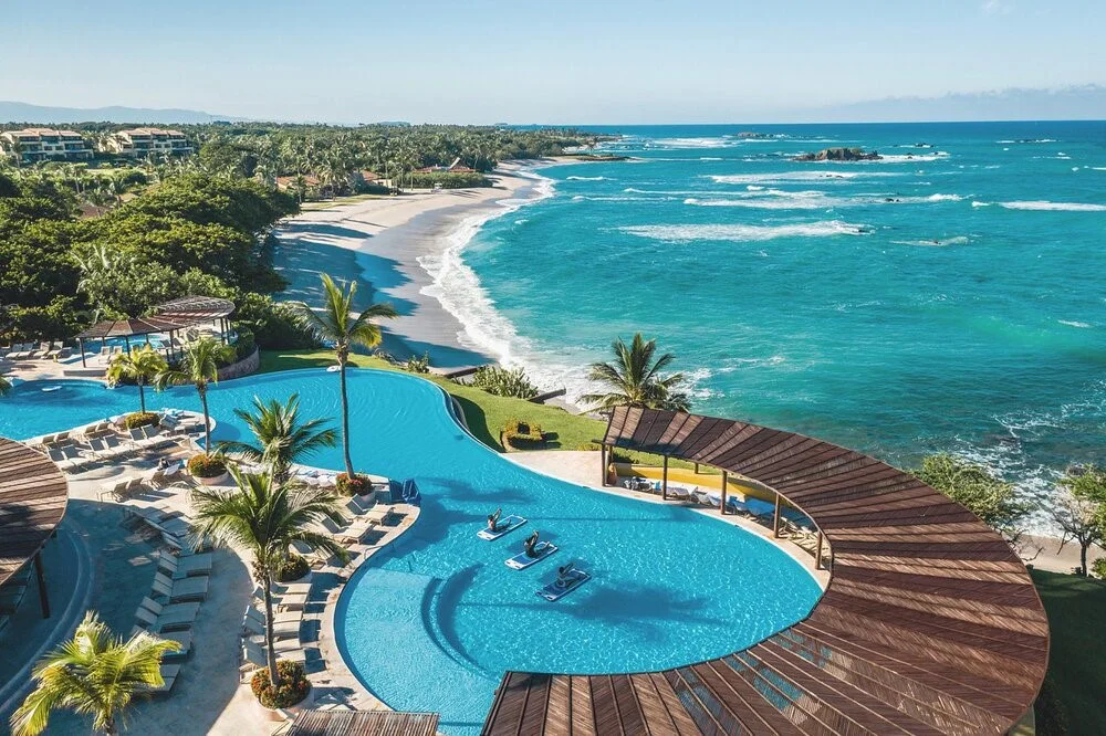 Punta Mita Beach Club with white sand and crystal clear turquoise water in Riviera Nayarit, Mexico