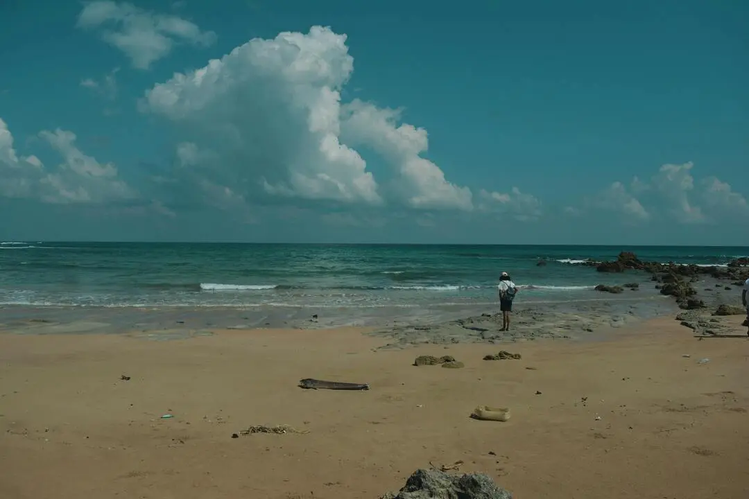 solo traveller on a beach