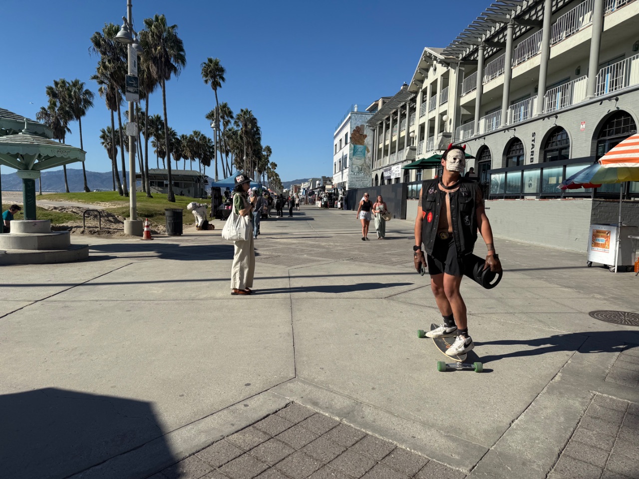 Cycle from Santa Monica to Venice Beach and stroll around Ocean Front Walk
