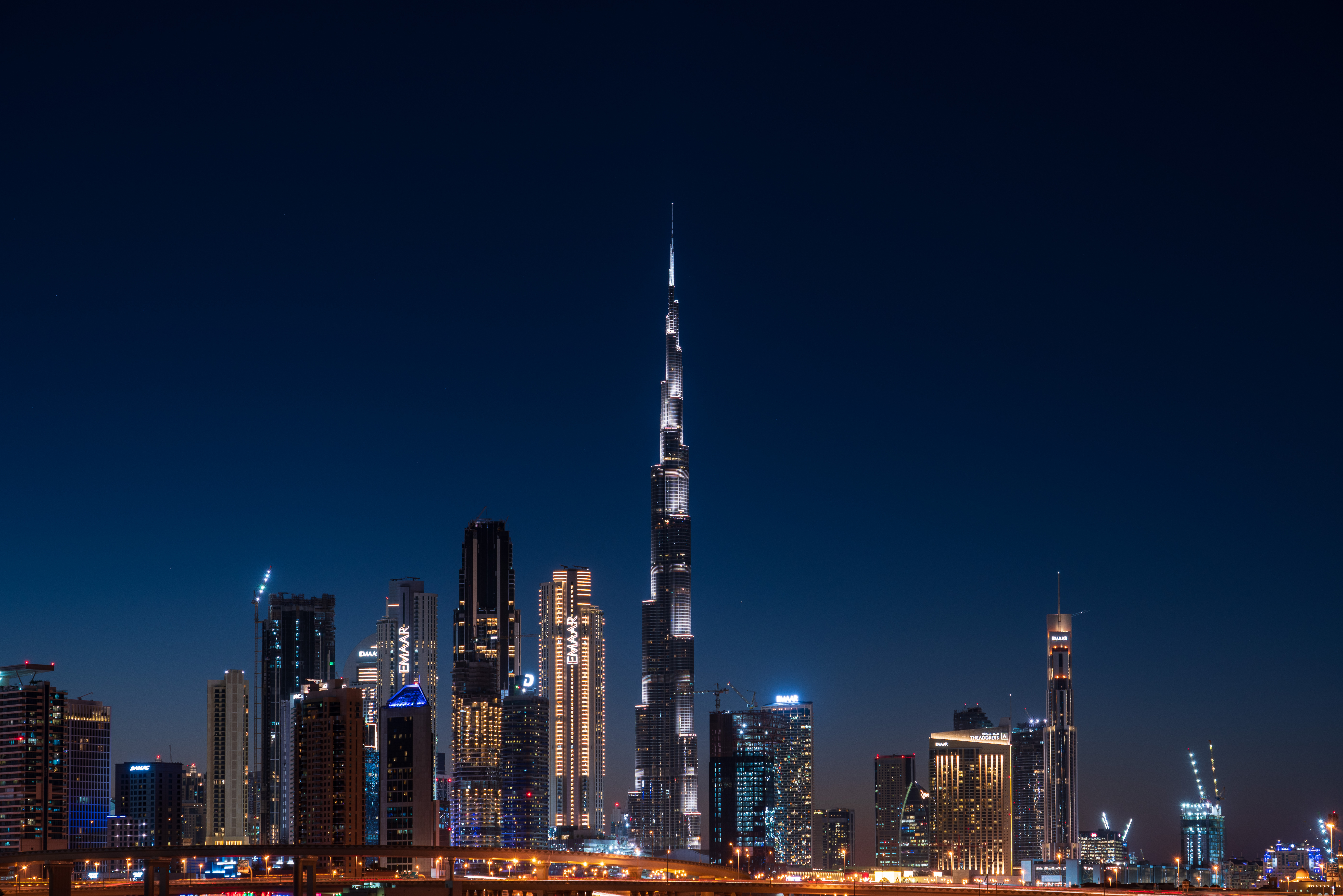 Downtown Dubai aerial skyline with towers and highways