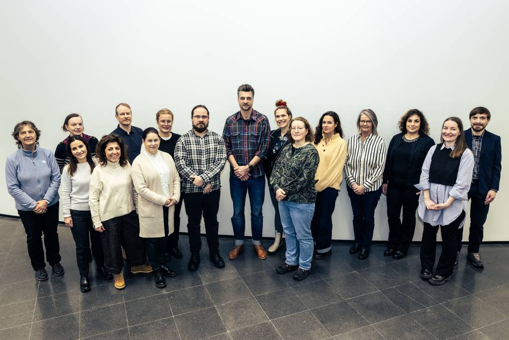The picture is a photo of the researchers and representatives of the NGOs who are participating in the project. 16 people are in it.