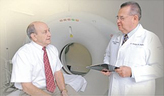 Provider with patient doing CT scan