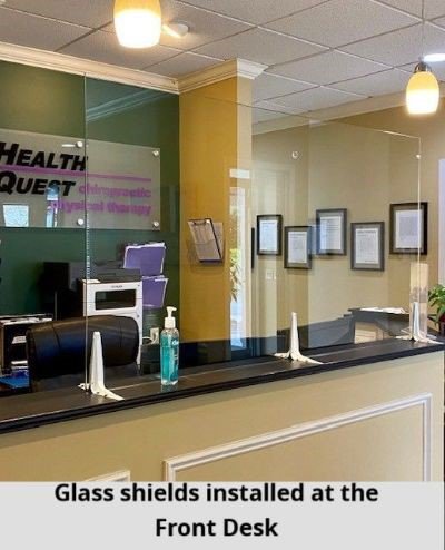 Glass shields installed at the front desk