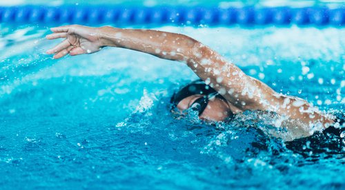 swimmer doing overhead stroke