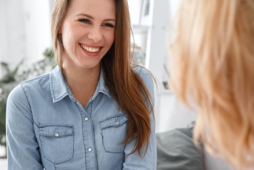 Coding Specialist Talking to Lady