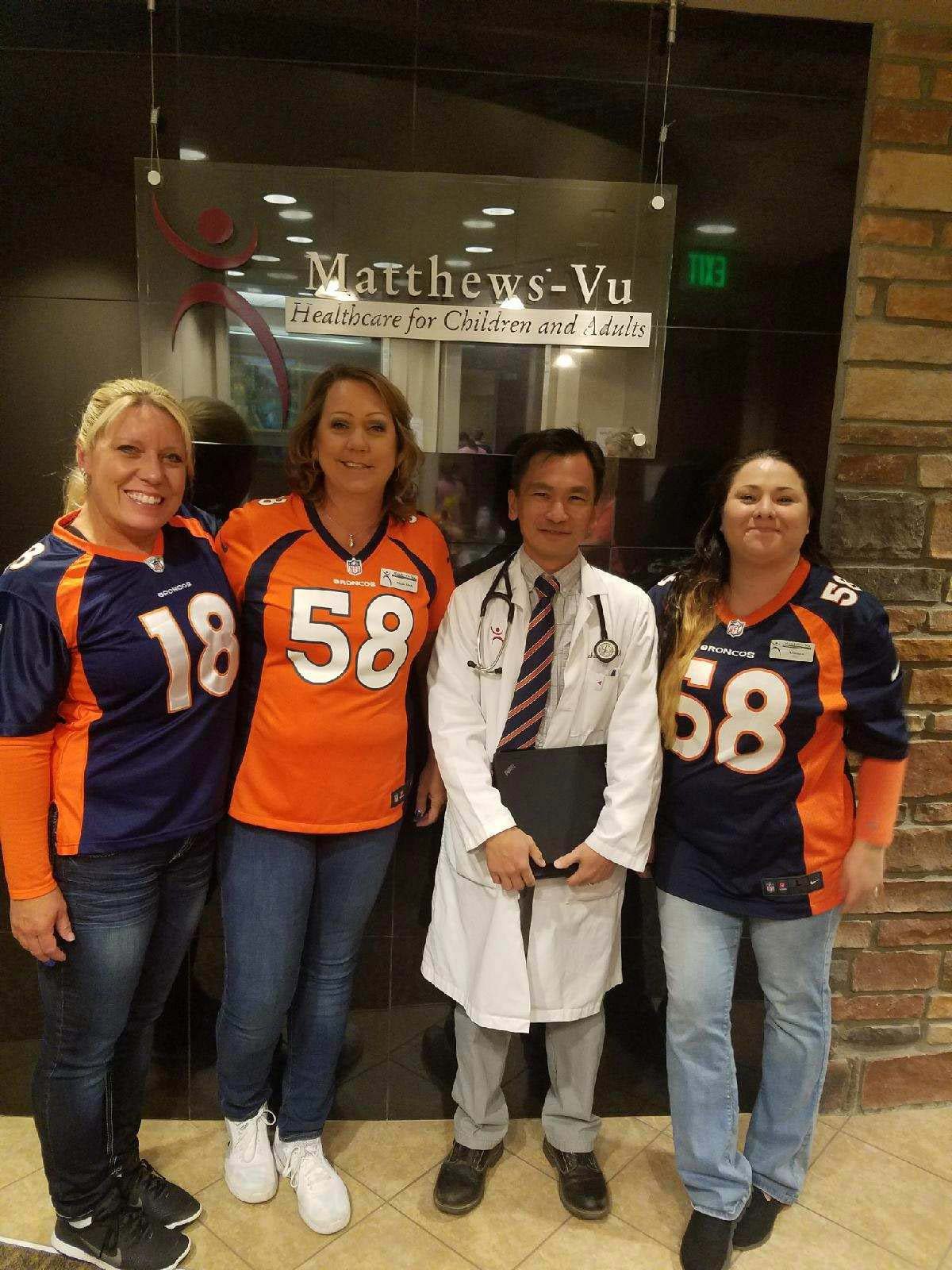 Staff Wearing Broncos Jerseys